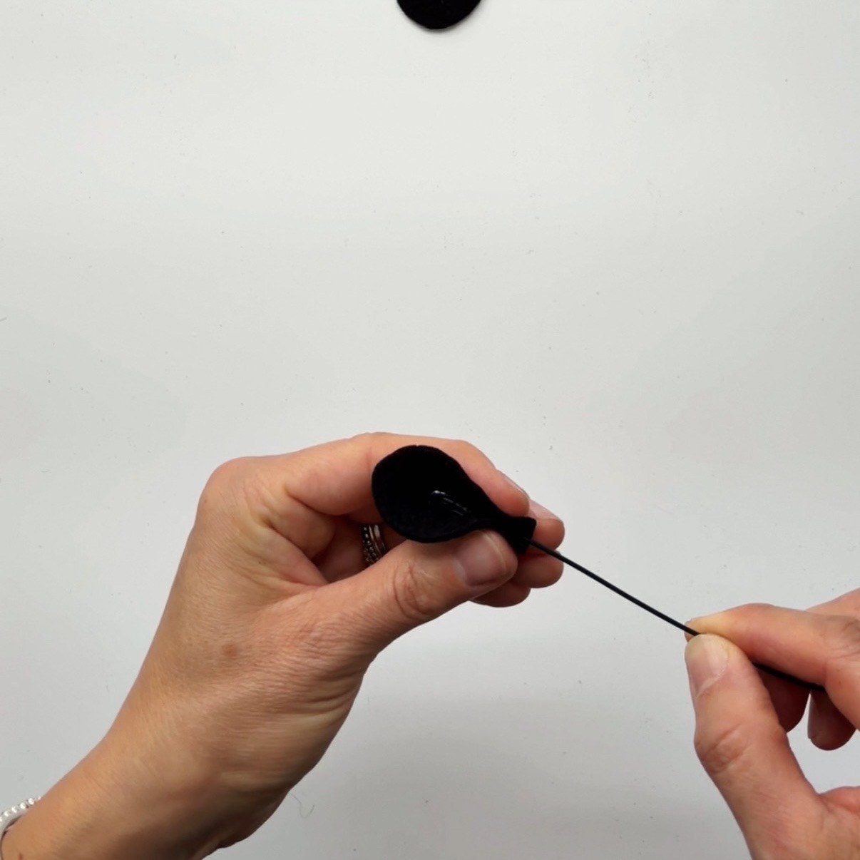 Wrap the petal around the loop