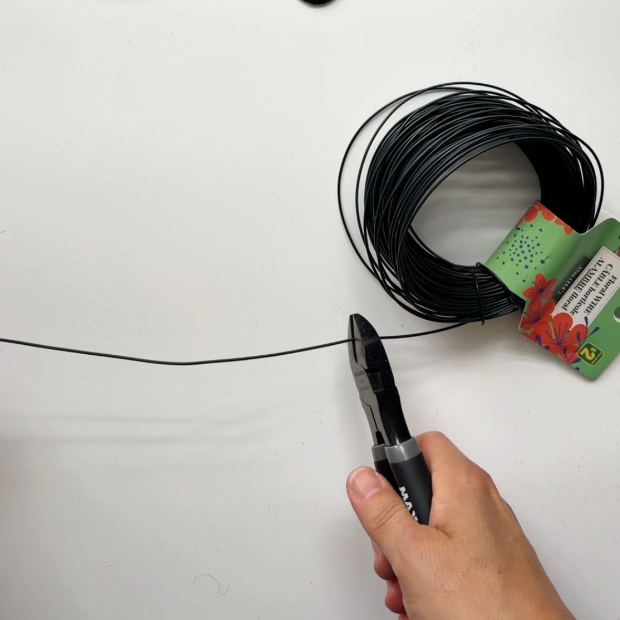 Cut the floral wire with the pliers